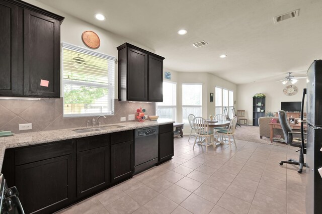 kitchen with dishwasher, a sink, a ceiling fan, recessed lighting, and decorative backsplash