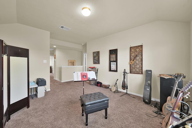 workout room featuring vaulted ceiling, carpet floors, and baseboards