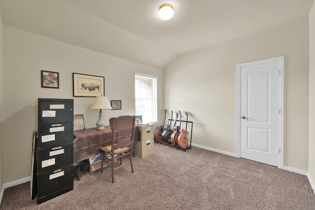 office space with carpet, vaulted ceiling, and baseboards