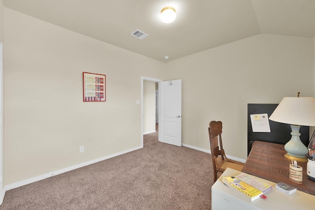 office space featuring carpet, lofted ceiling, and baseboards