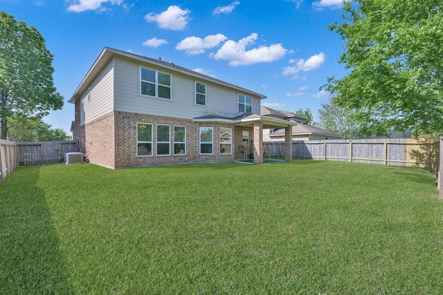 rear view of property with brick siding and central air condition unit