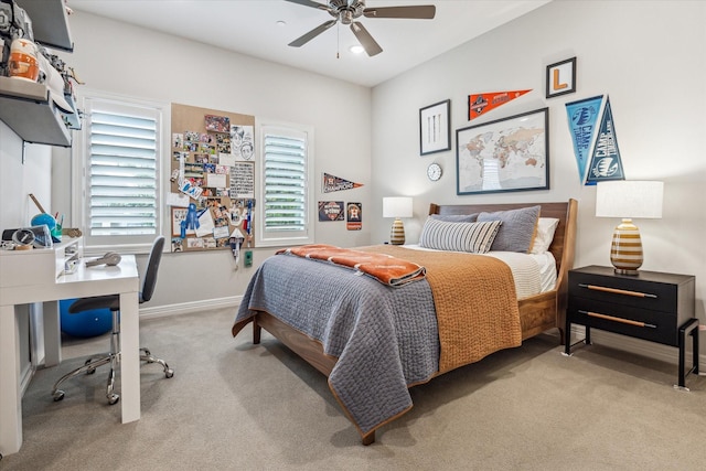 carpeted bedroom featuring a desk, baseboards, a ceiling fan, and recessed lighting