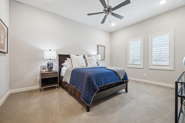 bedroom with light carpet, baseboards, recessed lighting, and ceiling fan