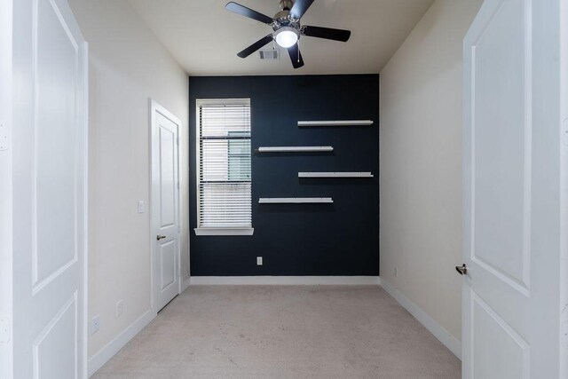 94 N Hutcheson St, Houston, TX 77003 - spare room featuring light carpet, a ceiling fan, and baseboards