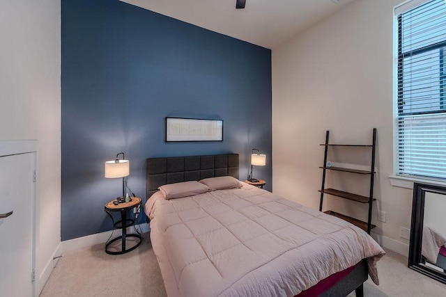 94 N Hutcheson St, Houston, TX 77003 - carpeted bedroom with multiple windows and baseboards