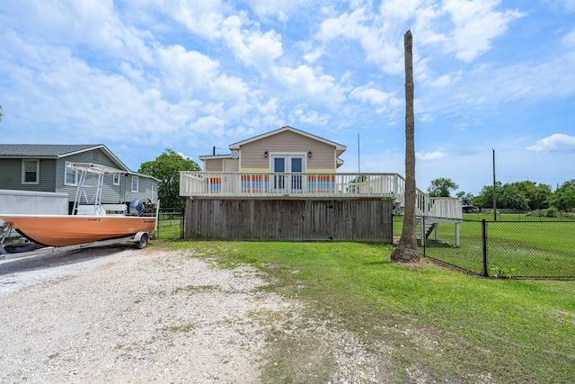 5024 County Road 476a, Freeport, TX 77541 - back of house with a deck and french doors