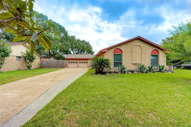 ranch-style house featuring brick siding and concrete driveway