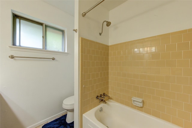 bathroom featuring toilet and shower / bath combination
