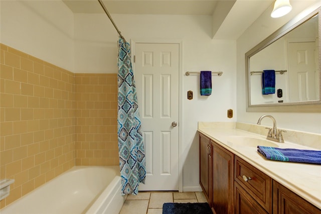 full bathroom with tile patterned flooring, vanity, and shower / bath combo with shower curtain