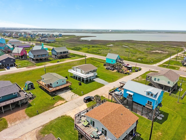 119 Nesmith Pl, Surfside Beach, TX 77541 - aerial view of residential area featuring a nearby body of water