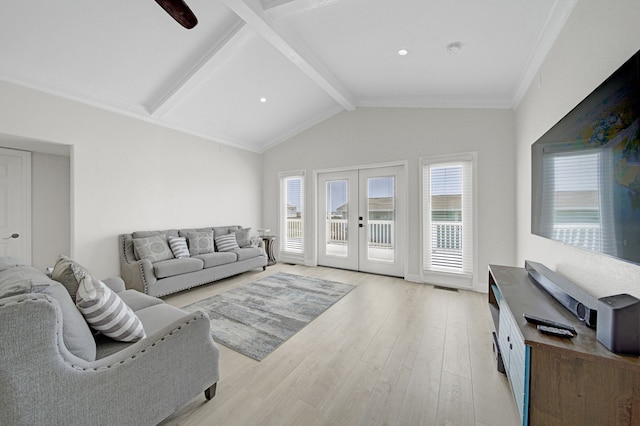 119 Nesmith Pl, Surfside Beach, TX 77541 - living room with french doors, light wood finished floors, and healthy amount of natural light