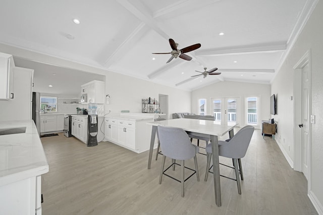 119 Nesmith Pl, Surfside Beach, TX 77541 - kitchen featuring stainless steel electric range oven, healthy amount of natural light, a ceiling fan, white cabinets, and recessed lighting