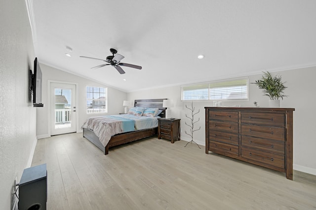 119 Nesmith Pl, Surfside Beach, TX 77541 - bedroom with vaulted ceiling, light wood-style floors, multiple windows, and access to exterior