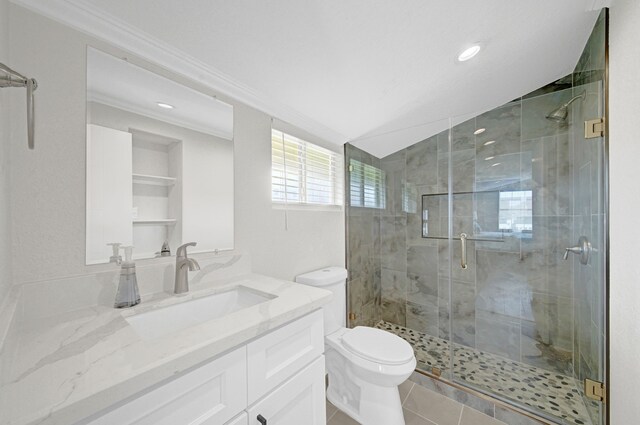 119 Nesmith Pl, Surfside Beach, TX 77541 - bathroom with vanity, toilet, a stall shower, crown molding, and tile patterned flooring