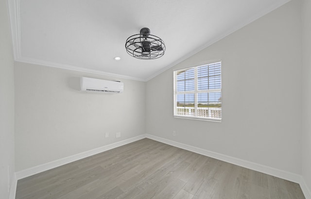 119 Nesmith Pl, Surfside Beach, TX 77541 - spare room featuring a wall mounted AC, crown molding, wood finished floors, vaulted ceiling, and a ceiling fan