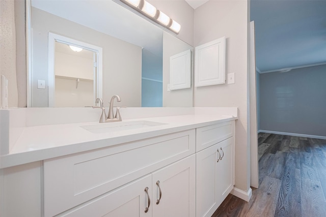 14555 Wunderlich Dr Unit 2307, Houston, TX 77069 - bathroom with wood finished floors, vanity, and baseboards