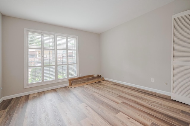 14555 Wunderlich Dr Unit 2307, Houston, TX 77069 - spare room with baseboards and wood finished floors