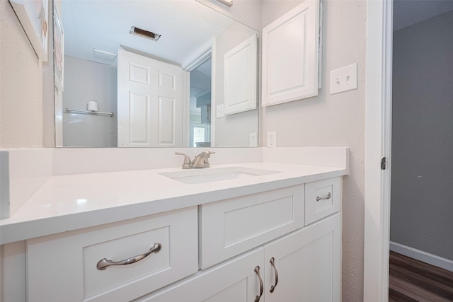 14555 Wunderlich Dr Unit 2307, Houston, TX 77069 - bathroom featuring vanity and wood finished floors