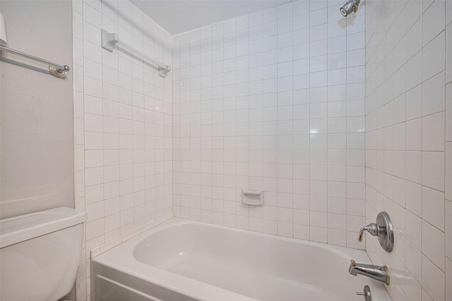 14555 Wunderlich Dr Unit 2307, Houston, TX 77069 - bathroom featuring toilet and washtub / shower combination