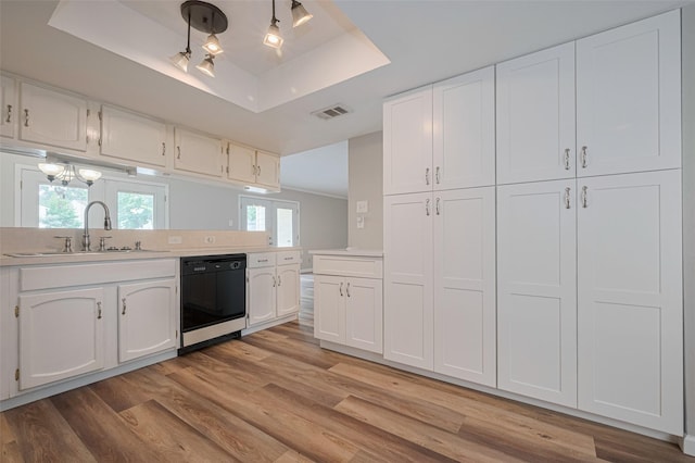 14555 Wunderlich Dr Unit 2307, Houston, TX 77069 - kitchen with dishwasher, a sink, a tray ceiling, white cabinets, and light wood-style flooring