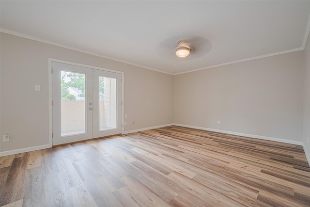 14555 Wunderlich Dr Unit 2307, Houston, TX 77069 - unfurnished room with french doors, baseboards, ornamental molding, and light wood-style flooring