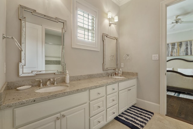 4606 W Alabama St, Houston, TX 77027 - ensuite bathroom featuring crown molding, a ceiling fan, double vanity, and baseboards
