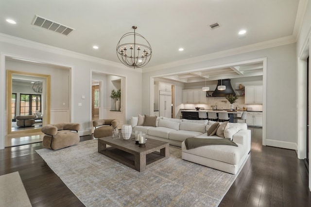 4606 W Alabama St, Houston, TX 77027 - living area featuring a chandelier, crown molding, dark wood-type flooring, and recessed lighting