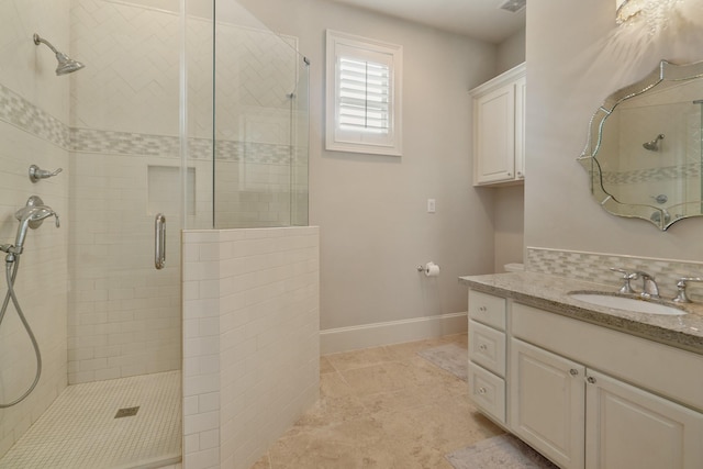4606 W Alabama St, Houston, TX 77027 - bathroom with a shower stall, vanity, and baseboards