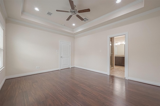 1606 Parker St, Houston, TX 77007 - empty room with a tray ceiling, ceiling fan, wood finished floors, ornamental molding, and baseboards