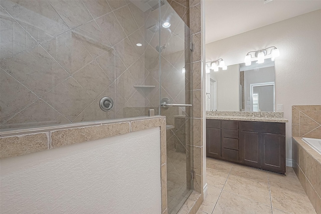 1606 Parker St, Houston, TX 77007 - full bath with tiled shower, vanity, a garden tub, and tile patterned flooring