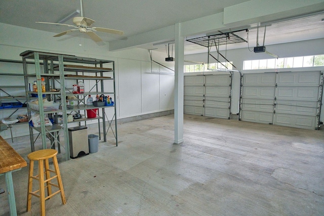 5361 County Road 868e, Brazoria, TX 77422 - garage with a garage door opener and ceiling fan
