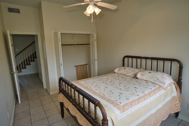 5361 County Road 868e, Brazoria, TX 77422 - bedroom with tile patterned floors, a closet, baseboards, and ceiling fan