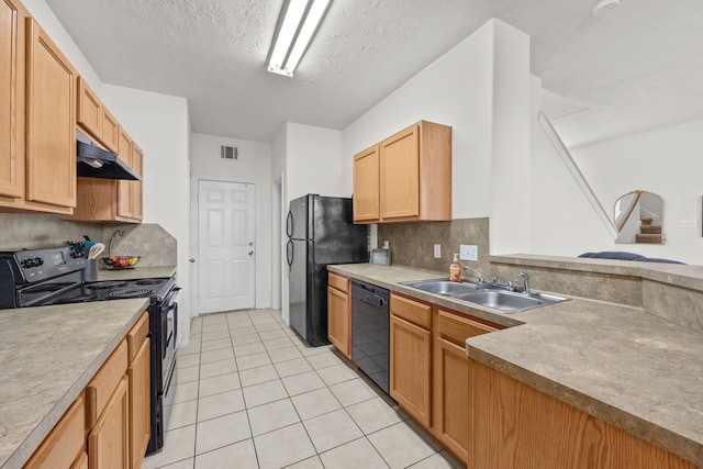 15914 Langhamwood Ln, Houston, TX 77084 - kitchen featuring black appliances, under cabinet range hood, a sink, backsplash, and a textured ceiling