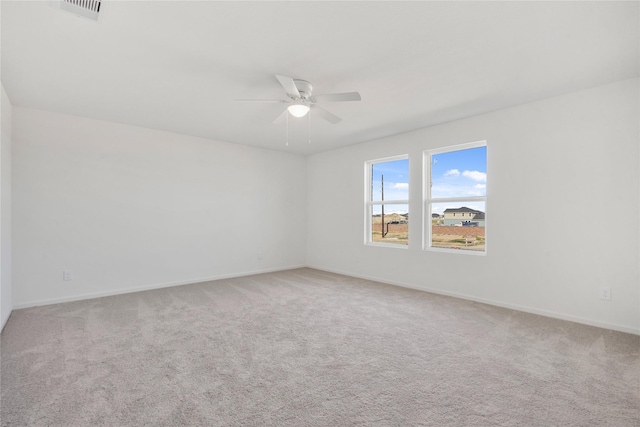 27214 Leeward Jetty Dr, Katy, TX 77493 - carpeted empty room with ceiling fan and baseboards