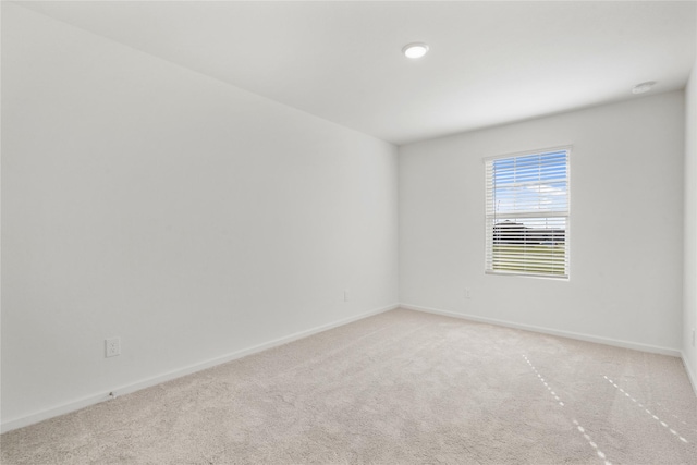 27214 Leeward Jetty Dr, Katy, TX 77493 - spare room featuring light carpet and baseboards