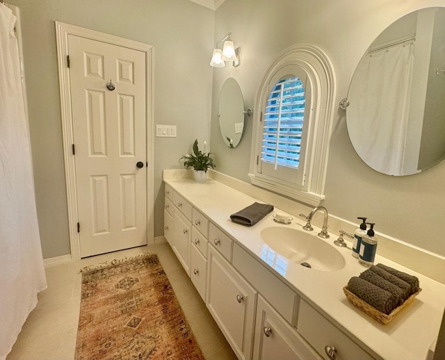 3911 Swarthmore St, Houston, TX 77005 - bathroom featuring vanity and tile patterned flooring