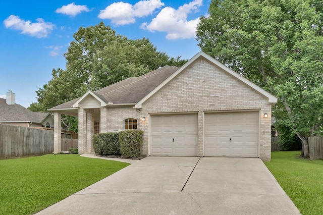 3722 Lovers Ln, Montgomery, TX 77356 - single story home featuring a garage, driveway, a shingled roof, and brick siding