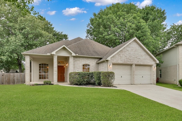 3722 Lovers Ln, Montgomery, TX 77356 - view of front facade with an attached garage, roof with shingles, brick siding, and concrete driveway