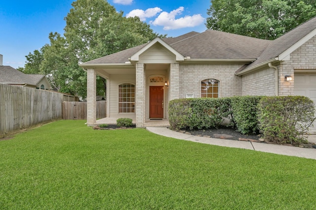 3722 Lovers Ln, Montgomery, TX 77356 - view of front facade featuring roof with shingles, brick siding, and an attached garage