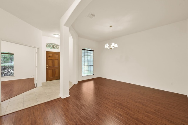 3722 Lovers Ln, Montgomery, TX 77356 - foyer entrance featuring wood finished floors and a chandelier