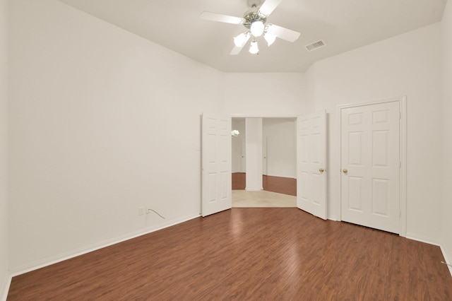 3722 Lovers Ln, Montgomery, TX 77356 - unfurnished bedroom featuring wood finished floors, baseboards, and a ceiling fan