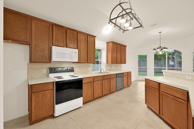 3722 Lovers Ln, Montgomery, TX 77356 - kitchen with white microwave, electric range, black dishwasher, decorative backsplash, and lofted ceiling