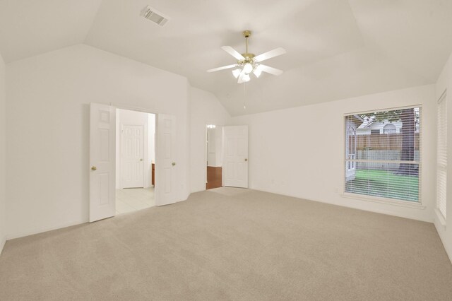 3722 Lovers Ln, Montgomery, TX 77356 - unfurnished bedroom with lofted ceiling, carpet flooring, and a ceiling fan
