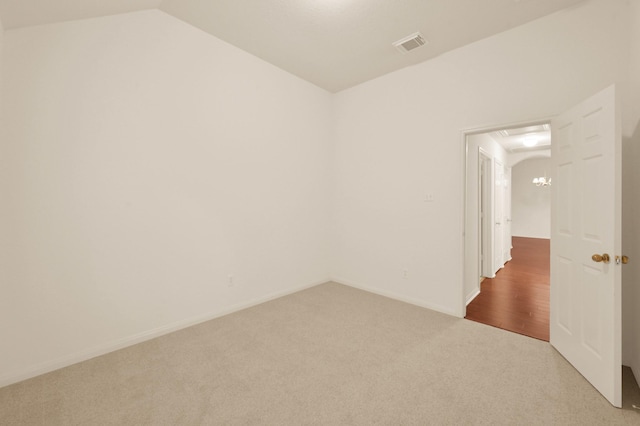 3722 Lovers Ln, Montgomery, TX 77356 - spare room with carpet flooring, vaulted ceiling, and baseboards