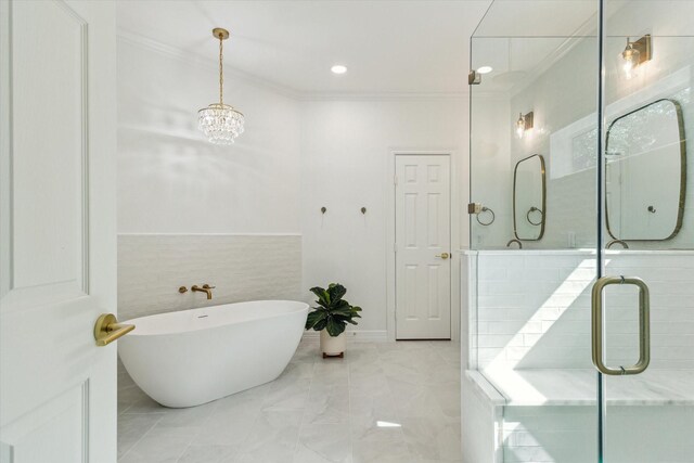 15411 Parkwood Way, Houston, TX 77059 - bathroom with crown molding, a freestanding bath, a chandelier, and marble finish floors