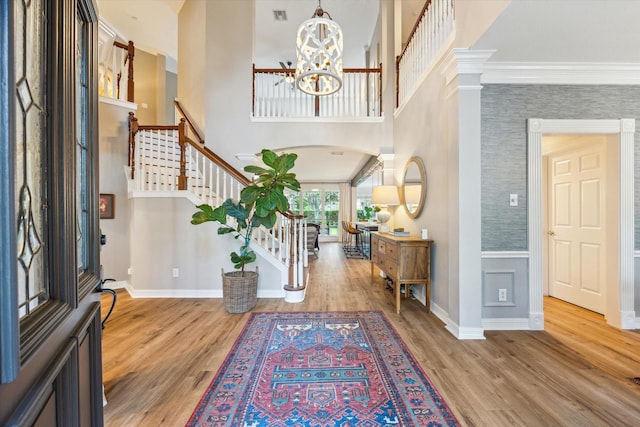 15411 Parkwood Way, Houston, TX 77059 - entrance foyer with stairs, a chandelier, wood finished floors, baseboards, and a towering ceiling