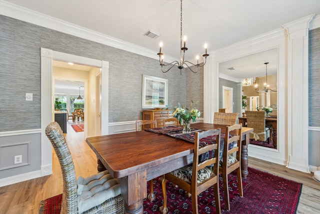 15411 Parkwood Way, Houston, TX 77059 - dining room featuring a chandelier, light wood-type flooring, wainscoting, ornamental molding, and wallpapered walls