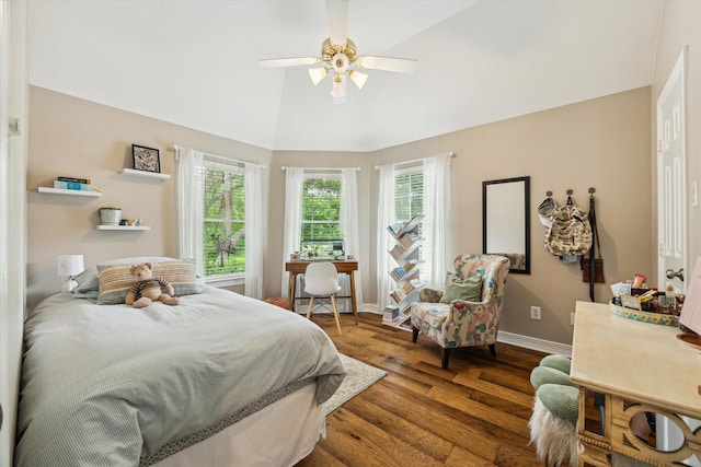 15411 Parkwood Way, Houston, TX 77059 - bedroom featuring dark wood finished floors, baseboards, vaulted ceiling, and ceiling fan