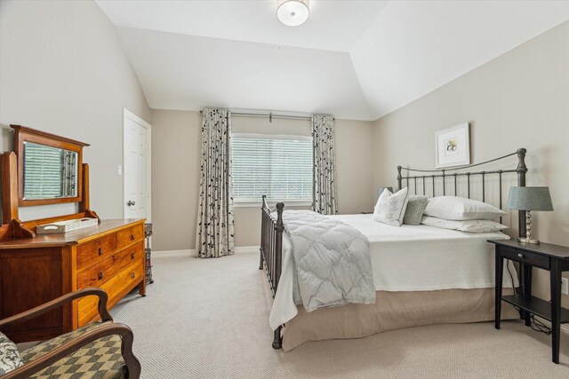 15411 Parkwood Way, Houston, TX 77059 - bedroom with vaulted ceiling, carpet, and baseboards