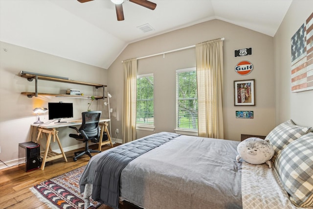 15411 Parkwood Way, Houston, TX 77059 - bedroom with vaulted ceiling, wood finished floors, ceiling fan, an office area, and baseboards